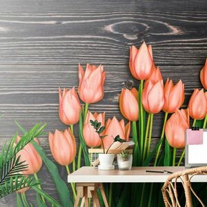 Fotótapéta narancssárga tulipánok fa háttéren kép